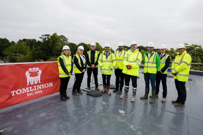 Topping out ceremony marks milestone for Alderbrook School